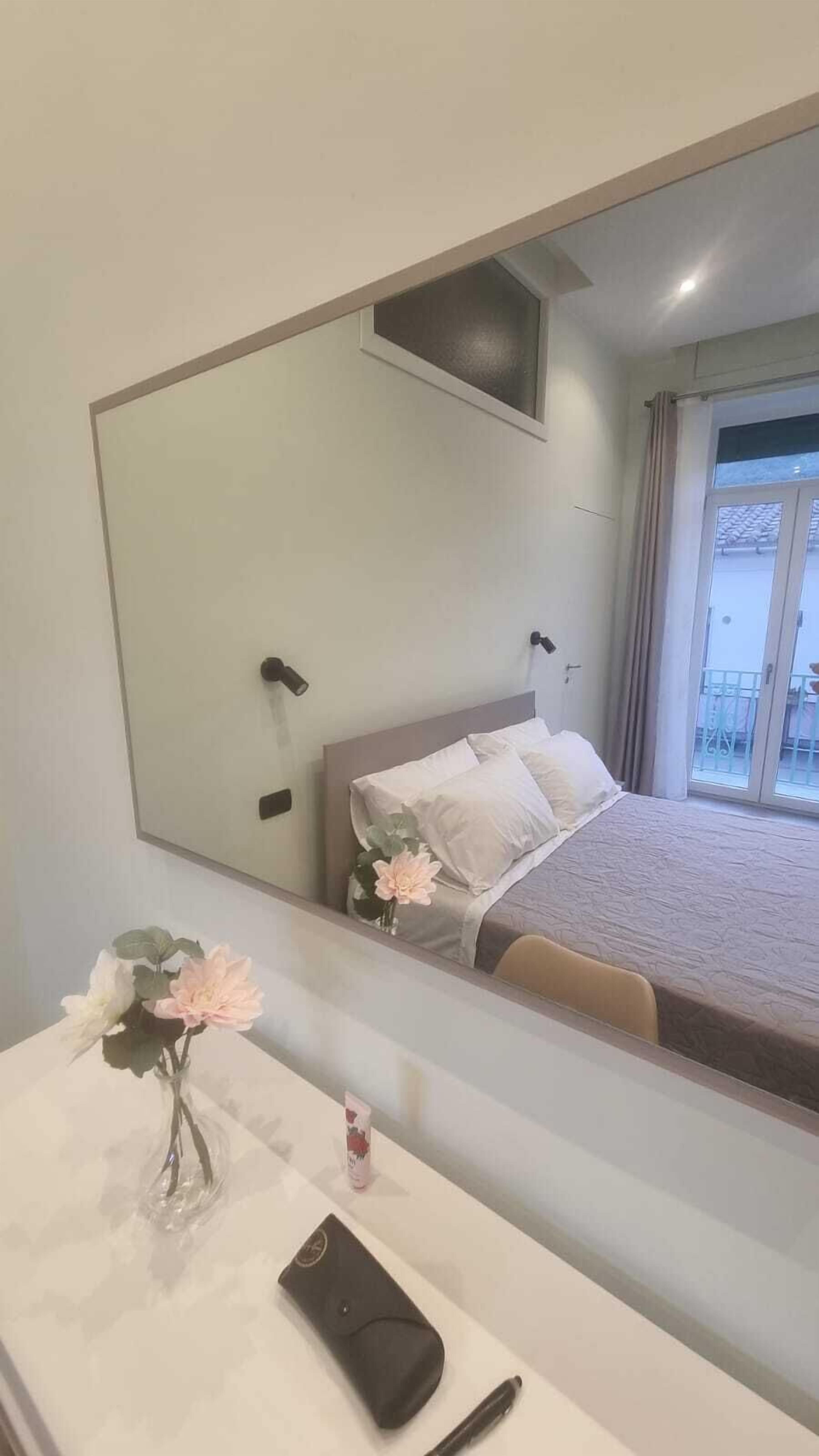 Desk, laptop workspace, blackout drapes, cribs/infant beds