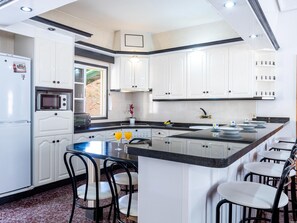 Fridge, microwave, coffee/tea maker, toaster