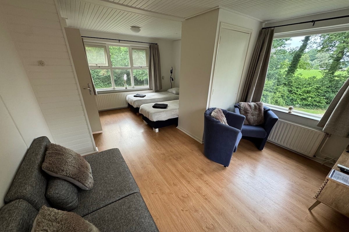 Appartement, meerdere bedden, kitchenette, uitzicht op tuin | Verduisterende gordijnen, geluiddichte muren, gratis wifi