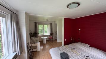 Apartment, Multiple Beds, Kitchenette, Garden View | Blackout drapes, soundproofing, free WiFi