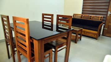 Family Suite, Balcony, Garden View | In-room dining