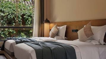 Chambre Élite avec lits jumeaux, vue jardin
