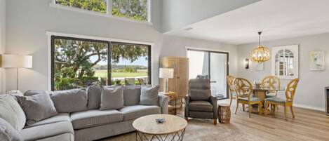 Living room with pullout sofa and vaulted ceilings