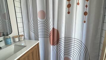 Hair dryer, towels, soap, shampoo