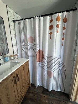 Hair dryer, towels, soap, shampoo