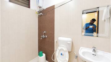 Shower, free toiletries, slippers, towels