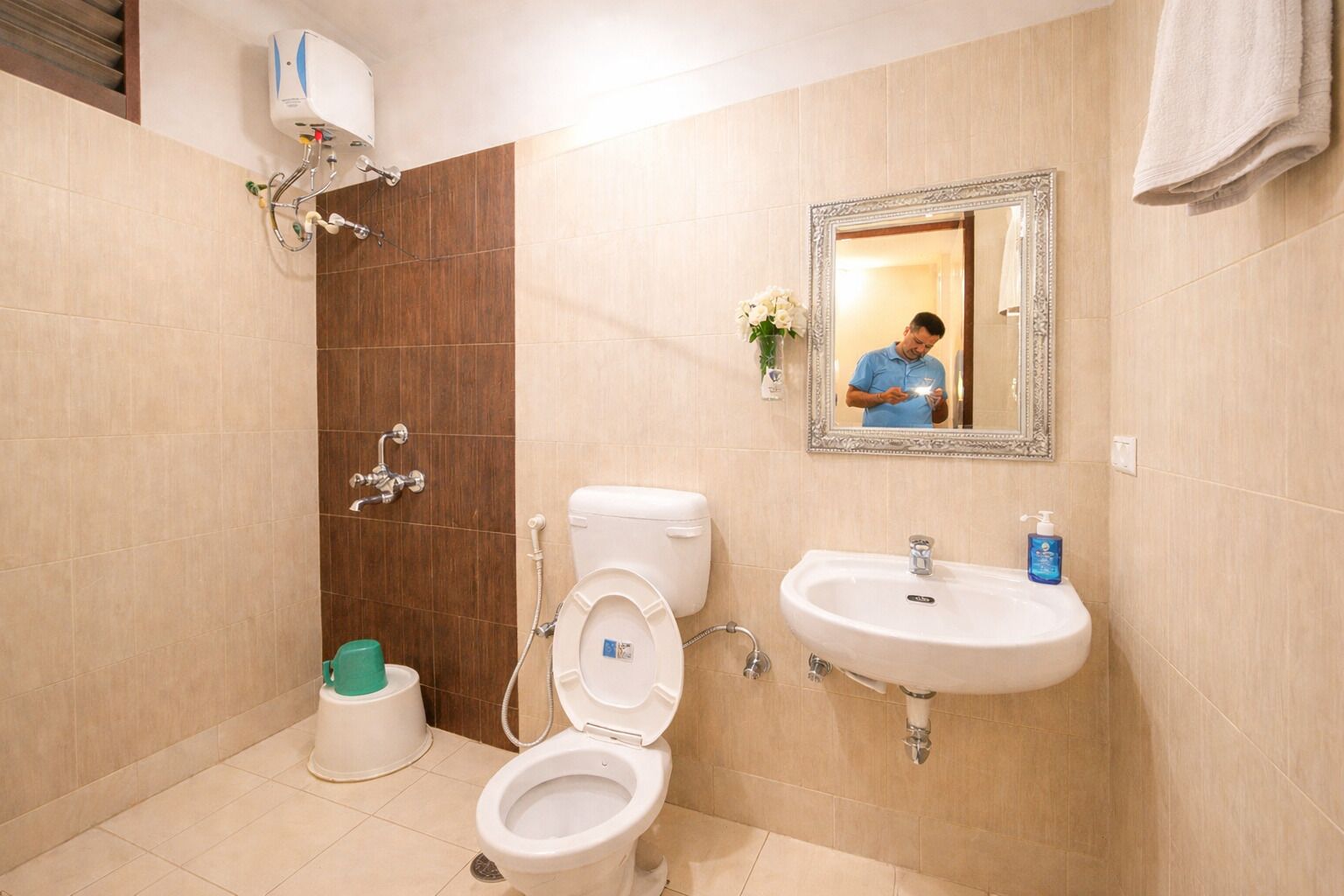 Shower, free toiletries, slippers, towels