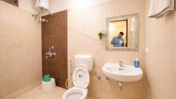 Shower, free toiletries, slippers, towels