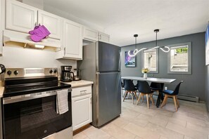 Fridge, toaster, cookware/dishes/utensils
