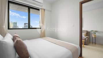 Apartemen, 1 kamar tidur, pemandangan kota | 1 kamar tidur, ruang kerja ramah laptop, dan setrika/meja setrika