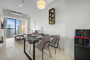 Apartment, 1 Bedroom, City View | Living area | 55-inch Smart TV with cable channels, Netflix, streaming services