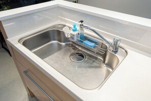 Family Apartment, Multiple Beds, Non Smoking, Ground Floor | Private kitchen | Fridge, microwave, stovetop, coffee/tea maker
