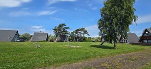 Property grounds - Finnenhütte "MH77" - Renovated Finnenhütte directly on the dune, approx. 80 m to the (Rostock)