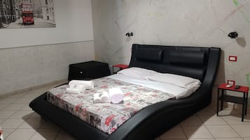 Comfort Room | Blackout drapes, iron/ironing board, free WiFi