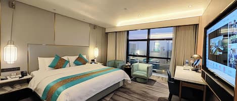Superior Suite, City View | 1 bedroom, in-room safe, blackout curtains, iron/ironing board