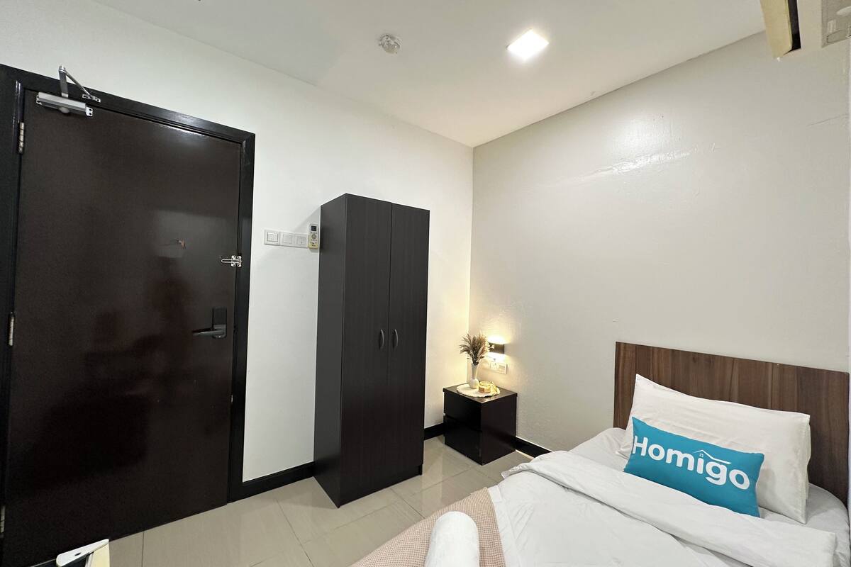 Habitación básica | 1 dormitorio, escritorio, wifi gratis y ropa de cama