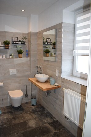 Douche, serviettes fournies