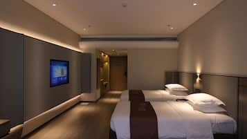 Habitación superior con 2 camas individuales | Camas con efecto memoria, escritorio y espacio para trabajar con laptop