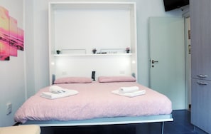 2 chambres, fer et planche à repasser, Wi-Fi, draps fournis