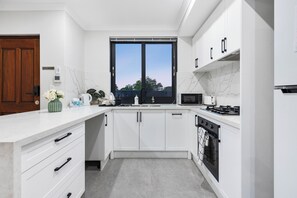 Fridge, microwave, oven, stovetop