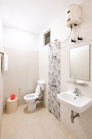 Shower, rainfall showerhead, slippers, towels