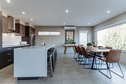 Relax & watch magical sunsets upstairs balconies overlooking the beautiful lake