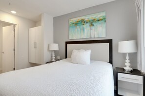 1 bedroom, desk, iron/ironing board, travel crib