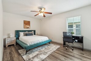1 bedroom, desk, iron/ironing board, travel crib