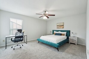 1 bedroom, desk, iron/ironing board, travel crib