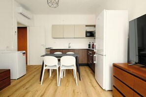 Apartment, 1 Double Bed with Sofa bed, Balcony | Private kitchen | Espresso maker, electric kettle, dining tables - 1-Bed apartment with balcony near subway (Milan)