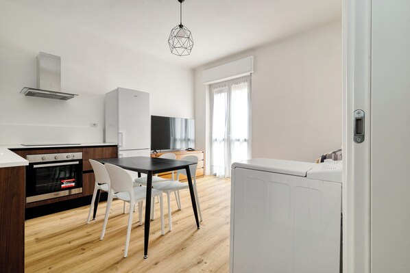 Comfort Apartment, City View | Living area | 43-inch Smart TV with digital channels