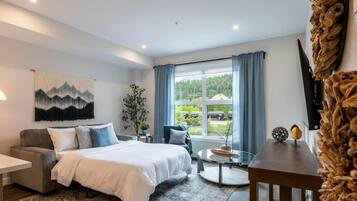 1 bedroom, desk, iron/ironing board, travel crib