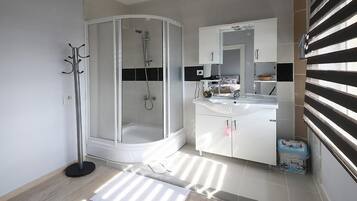 Hair dryer, slippers, towels, soap