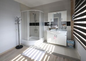 Hair dryer, slippers, towels, soap