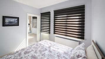 Desk, laptop workspace, blackout curtains