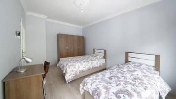 Desk, laptop workspace, blackout curtains