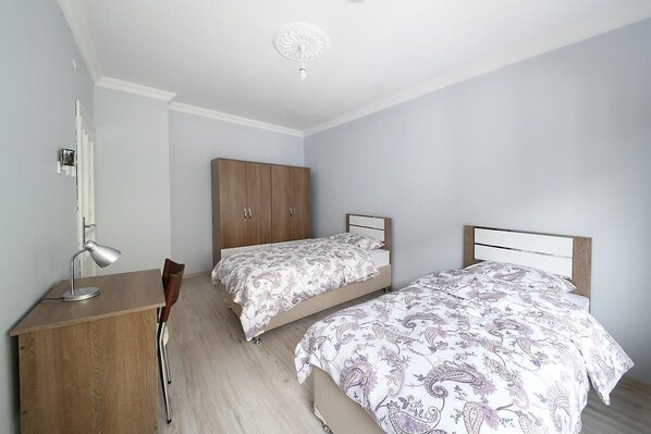 Desk, laptop workspace, blackout drapes