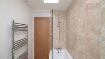Shower, towels, soap, toilet paper
