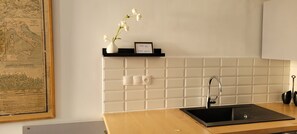 Fridge, microwave, stovetop, coffee/tea maker