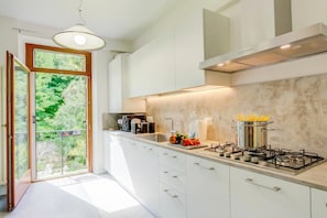Family Apartment, Multiple Bedrooms, 2 Bathrooms (Boutique Terrace Apartment In The) | Private kitchen | Fridge, microwave, oven, stovetop
