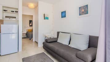 Rumah Standar, patio, pemandangan kebun | Area keluarga | Smart TV 100-cm dengan saluran TV satelit