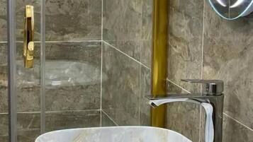 Rainfall showerhead, free toiletries, hair dryer, bathrobes