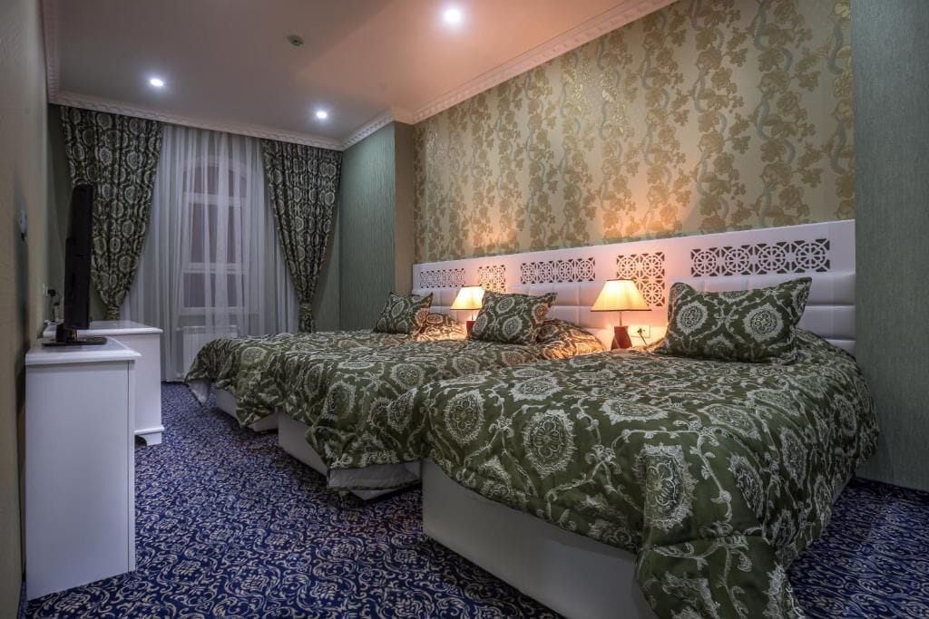 Family Room, City View | Premium bedding, minibar, in-room safe, individually decorated