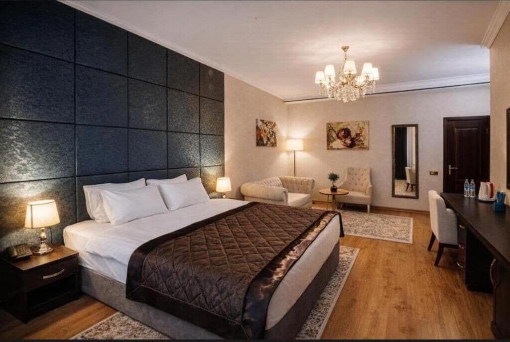 Family Triple Room | Premium bedding, minibar, in-room safe, individually decorated