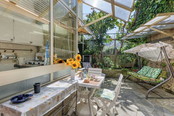 Family Apartment, Multiple Bedrooms (Best House Porto Vecchio E Ciclabile) | Outdoor dining