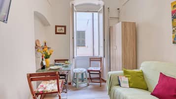 Standard Apartment, Multiple Bedrooms, 2 Bathrooms (Aurora La Petite Maison) | Living area | 21-inch TV with cable channels