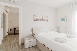 2 habitaciones y tabla de planchar con plancha 