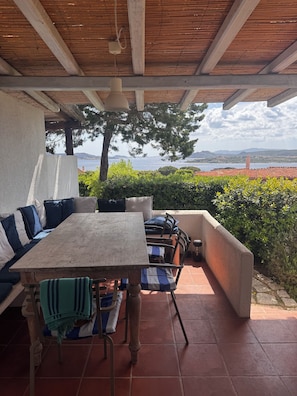 Outdoor dining - Porto Rafael Sea View Escape | Private Terrace, Beach & Village on Foot (Punta Sardegna)