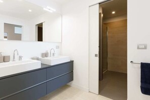 Shower, free toiletries, hair dryer, towels