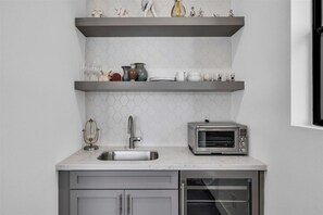 Microwave, coffee/tea maker, cookware/dishes/utensils